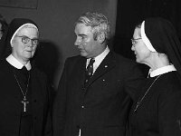 - Lyons0007874.jpg  Mr Sean Hannon CEO, Western Health Board speaking to two nuns. : 1974 Functions, 19740313 Sisters of St John of God Presentation Dinner 4.tif, Lyons collection