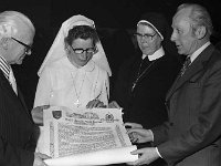 - Lyons0007876.jpg  Viewing the citation. Michael Joe Egan, President of Western Care and Mr Joe Mulrooney, Partry and two Sisters from St John of God. : 1974 Functions, 19740313 Sisters of St John of God Presentation Dinner 6.tif, Lyons collection