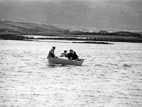 Order of Malta at work, 1968. - Lyons00-20970.jpg  Near William Jeffer's island home. On board with William is John Foy, Order of Malta, Westport; Seamus Hyland, Order of Malta; his sister Mrs Tommy Gibbons, Inish Lyre and his brother Sean Jeffers. : 19680323 Order of Malta at work 10.tif, Lyons collection, Order of Malta