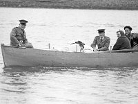 Order of Malta at work, 1968. - Lyons00-20976.jpg  Lighthouse keeper William Jeffers being brought back to his house on Inish Gort.  On board with William (Jeffers) is John Foy, Order of Malta, Westport; Seamus Hyland, Order of Malta; his sister Mrs Tommy Gibbons, Inish Lyre and his brother Sean Jeffers. : 19680323 Order of Malta at work 7.tif, Lyons collection, Order of Malta