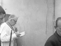 Pilgrimage Day on Croagh Patrick, 1972. - Lyons00-21020.jpg  Fr Tom Cummins saying mass. : 197207 Pilgrimage Day on Croagh Patrick 26.tif, Lyons collection, Order of Malta