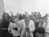 Pilgrimage Day on Croagh Patrick, 1972. - Lyons00-21026.jpg  Fr Tom Cummins blessing the pilgrims. : 197207 Pilgrimage Day on Croagh Patrick 4.tif, Lyons collection, Order of Malta