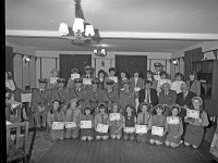 Order of Malta, persentations in the Central Hotel, 1983. - Lyons00-21050.jpg  Cadets and senior membershaving received their first-aid certificates. The three non-uniformed men in the middle row Dr Bert Farrell, Westport Medical Officer, Jeff O' Malley founder member in 1923 and Pake McEvilly. : 19830521 Presentations in the Central Hotel 2.tif, Lyons collection, Order of Malta