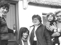 Irish Press Photo 1975 - Lyons00-21498.jpg  Ballycastle thatched cottages for rent started by Fr Loftus part of the community development programme showing a family moving in for a holiday.  Irish Press Terry O' Sullivan page. : 19750324 Ballycastle 2.tif, Irish Press, Lyons collection