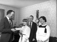 Irish Press Photo, 1982. - Lyons00-21531.jpg  Mr Padraig O' Connor Datsun Agent, Breaffy Rd, Castlebar presenting the £500 winning cheque for the Datsun competition in the Irish press to Ann Moran, Angelus Park to the obvious delight of her parents Mr and Mrs Joe Moran. : 19820422 Presentatio of £500 Cheque.tif, Irish Press, Lyons collection