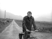 Irish Times photo, 1980. - Lyons00-21563.jpg  Irish Times columnist Michael Viney setting off on his cycle trip from his home in Killaghdoon in Mayo to County Clare to write a series of articles on his trip. A lonely road ahead. : 198008 Michael Viney's bicycle trip 1.tif, Irish Times, Lyons collection