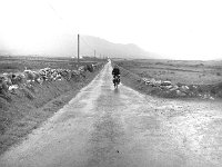 Irish Times photo, 1980. - Lyons00-21564.jpg  Irish Times columnist Michael Viney setting off on his cycle trip from his home in Killaghdoon in Mayo to County Clare to write a series of articles on his trip. : 198008 Michael Viney's bicycle trip 2.tif, Irish Times, Lyons collection