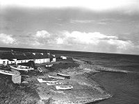 Irish Times photo, 1980. - Lyons00-21568.jpg  Kilcummin strand scene of the French landing led by General Humbert. Note the turf being stacked in front of the houses as it was Septemberwhich is the time for bringing home the saved turf from the bogs. : 19800903 Kilcummin Strand.tif, Irish Times, Lyons collection