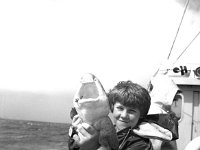 Irish Times photo, 1989 - Lyons00-21613.jpg  Fishing on Clew Bay. Junior angler with his catch. : 19890701 Fishing on Clew Bay 4.tif, Irish Times, Lyons collection