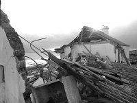 Irish Times photo, 1991. - Lyons00-21627.jpg  Another view of the storm damage to the fisherman's cottage at Purteen pier and Dooagh cottage for the Irish Times. : 19910108 Fisherman's cottage.tif, Irish Times, Lyons collection