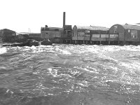 Irish Times photo, 1995. - Lyons00-21654.jpg  Foxford Woollen Mills on the shores of the river Moy.The mill was originally powered by a water mill in the factory using the fast flowing river. : 199501 Foxford Woolen Mills 2.tif, Irish Times, Lyons collection
